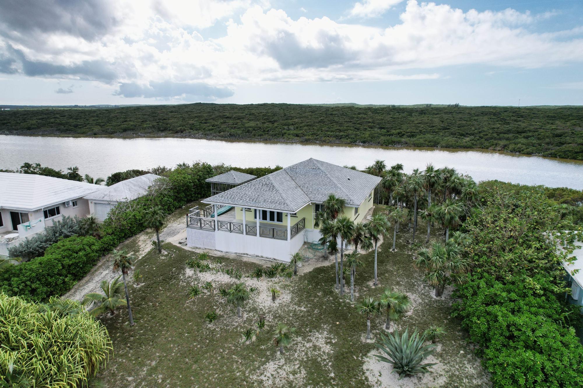 BEACHFRONT HOME & LOT