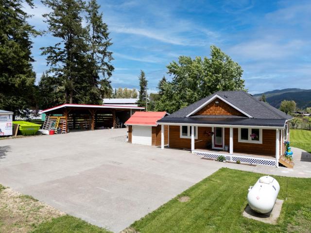Discover this beautifully renovated home on a private 3/4-acre lot in semi-rural Barriere, BC. Surrounded by expansive farmland, this property offers a tranquil farm-like atmosphere with modern comforts. The open-concept layout features a new kitchen with a granite island, seamlessly connecting to the living room. It includes two main-level bedrooms, a fully updated bathroom, and versatile basement rooms for an office or crafts, plus a large rec room. Recent upgrades include new electrical, a high-efficiency propane furnace, PEX plumbing, and efficient windows. A newly drilled well provides abundant water. Outdoors, enjoy a massive gazebo with a bar and gas fireplace, a 16x52 pole barn with a wired garage, additional covered parking, and a fully fenced yard. Located just minutes from Barriere and 40 minutes from Kamloops, this home blends rural charm with city convenience, ideal for those