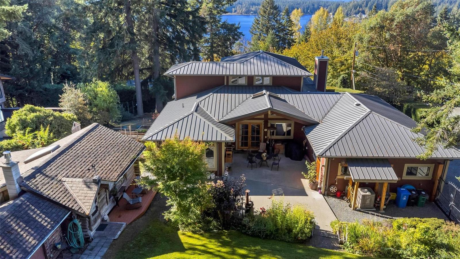 1870 Munsie Rd exterior with lake views