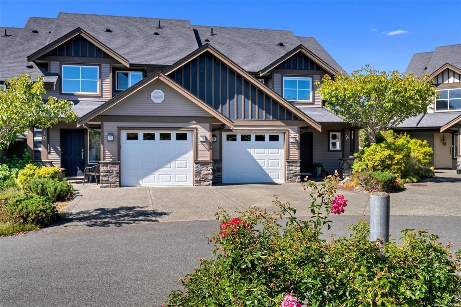 Exterior of 9 - 6250 Palahi Road, an end-unit townhome in Heron's Wood, Duncan BC